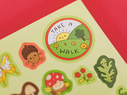 Set of colorful stickers with nature-themed designs on a red background