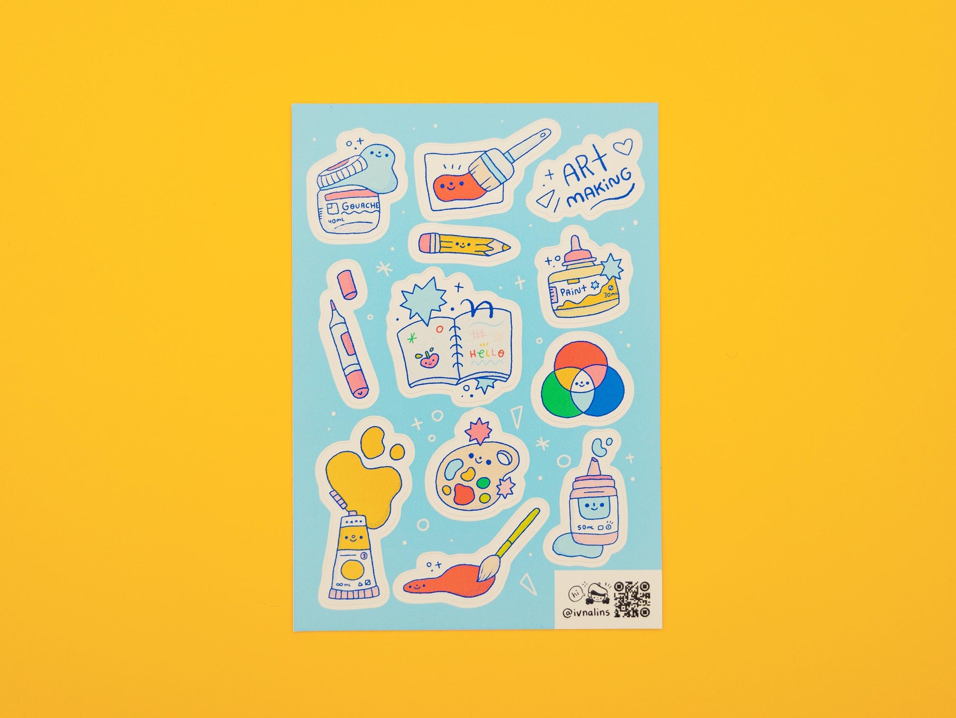 Sticker sheet with illustrations of art materials on a yellow background