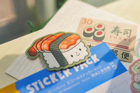 Sticker pack with a cute sushi design on a table