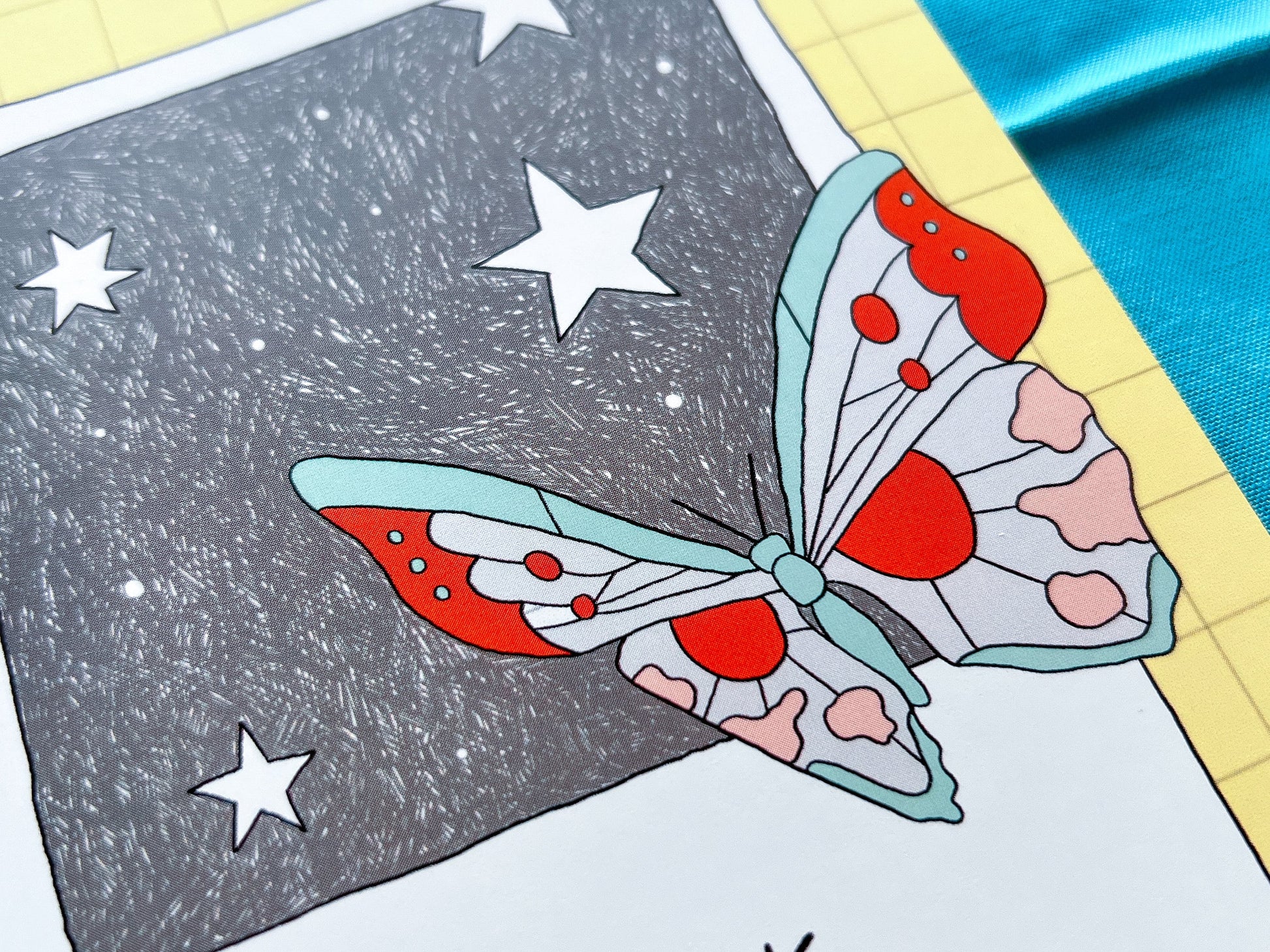 Colorful butterfly illustration on a polaroid picture frame with stars