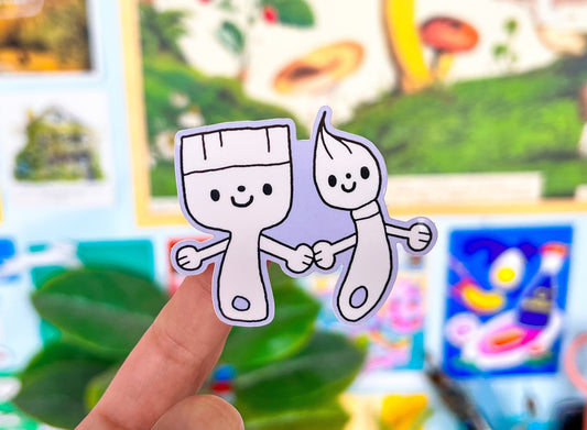 Two cartoon characters holding hands on a finger with a colorful blurred background