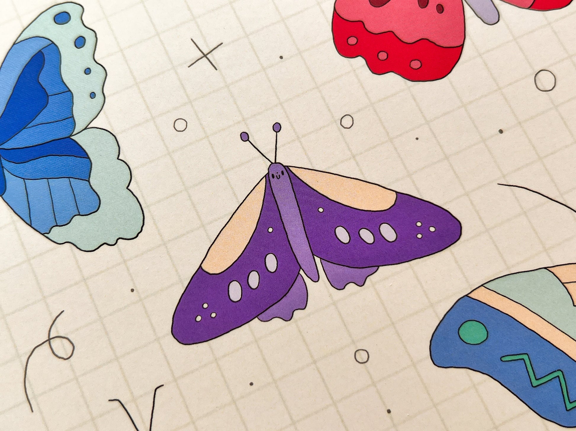 Colorful butterfly illustrations on a grid background