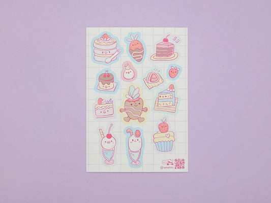 Sheet of cute cartoon stickers featuring cakes and desserts on a purple background