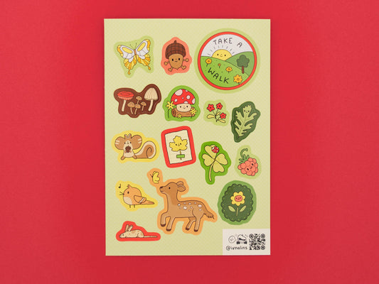 Sticker sheet with nature-themed designs on a red background
